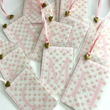 Load image into Gallery viewer, Crossbody Ivory Tote w/ Pink Accent handles and Coquette style Initial Bag Tag with charm